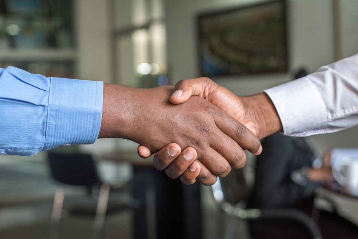 TRADION partners shaking hands